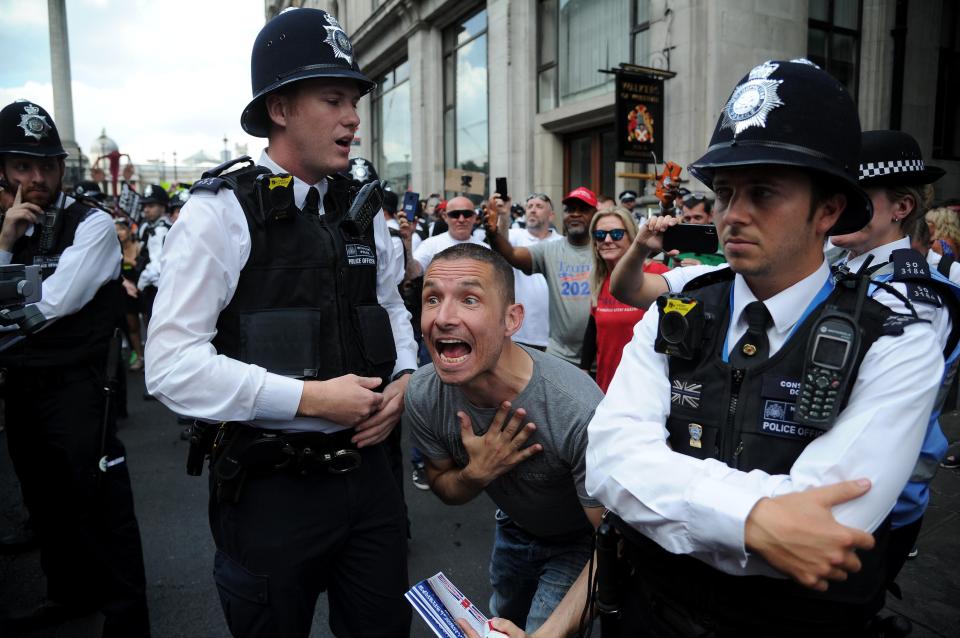  Tempers flare outside a pub near Trafalgar Square this afternoon