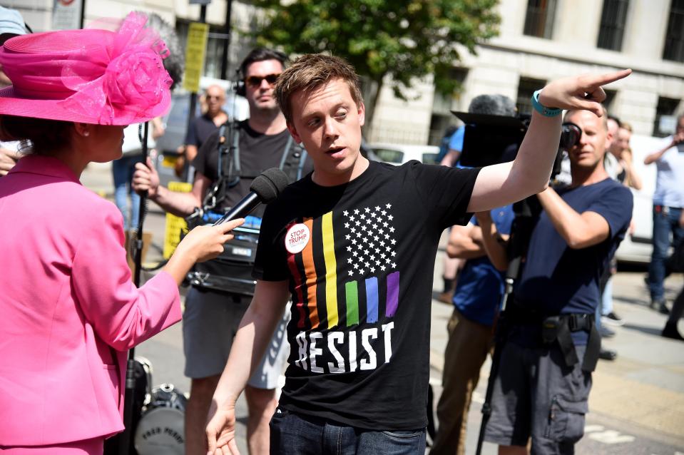  Outspoken leftie Owen Jones wore a 'resist' t-shirt as he took to the streets this afternoon