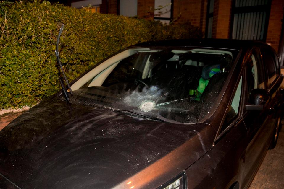  Police at the scene of a explosive device attack on the west Belfast home of former Sinn Fein president Gerry Adams