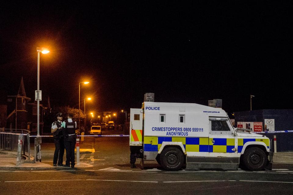  Police cordon off an area near the west Belfast home of senior Sinn Fein member Bobby Storey after an explosive device was thrown at the property