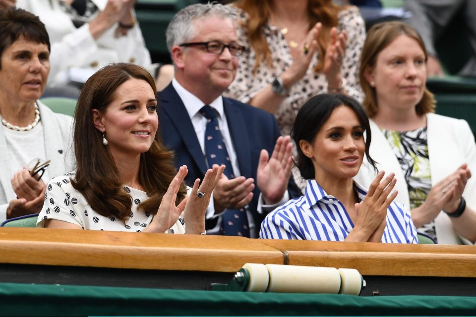  The pair applaud from the Royal Box as the players arrive in Centre Court