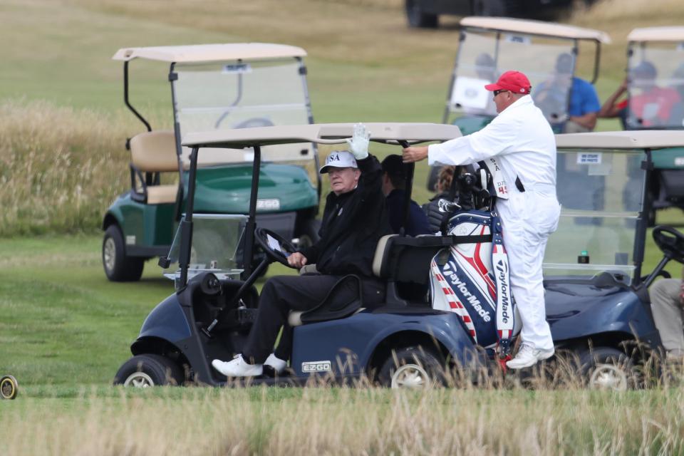  He was ferried around the course inside the ring of steel created to protect him during the UK visit