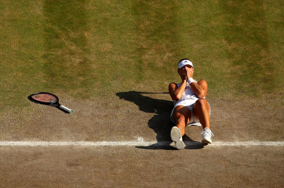 Angelique Kerber could barely believe it as she slumped to the turf