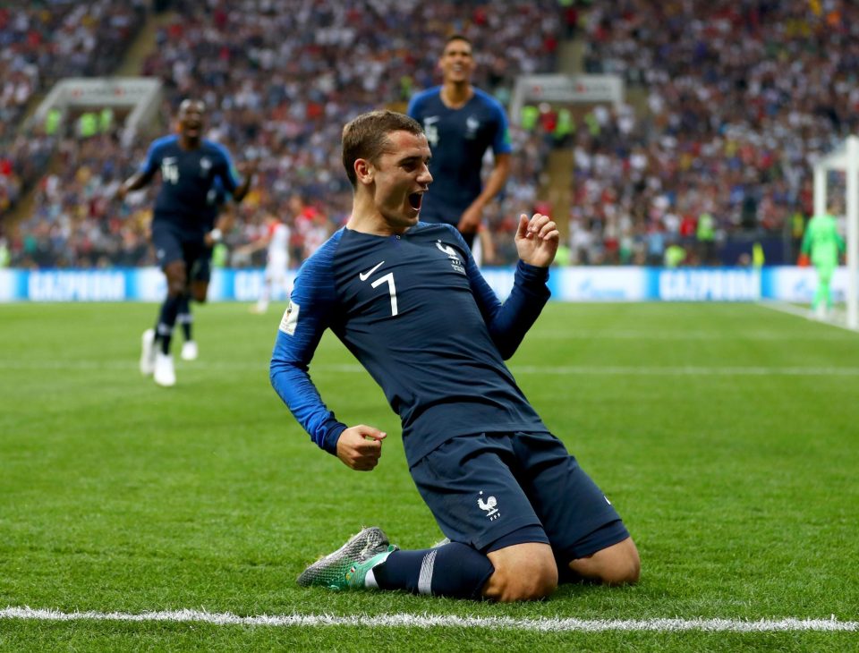 Antoine Griezmann celebrates after his free-kick led to Frances opener