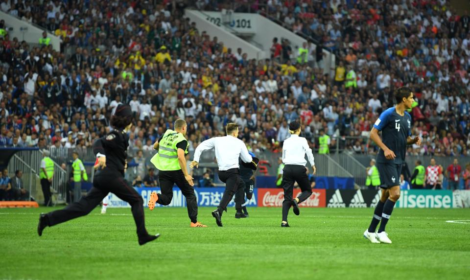 Pitch invaders stormed the field of play in the second half