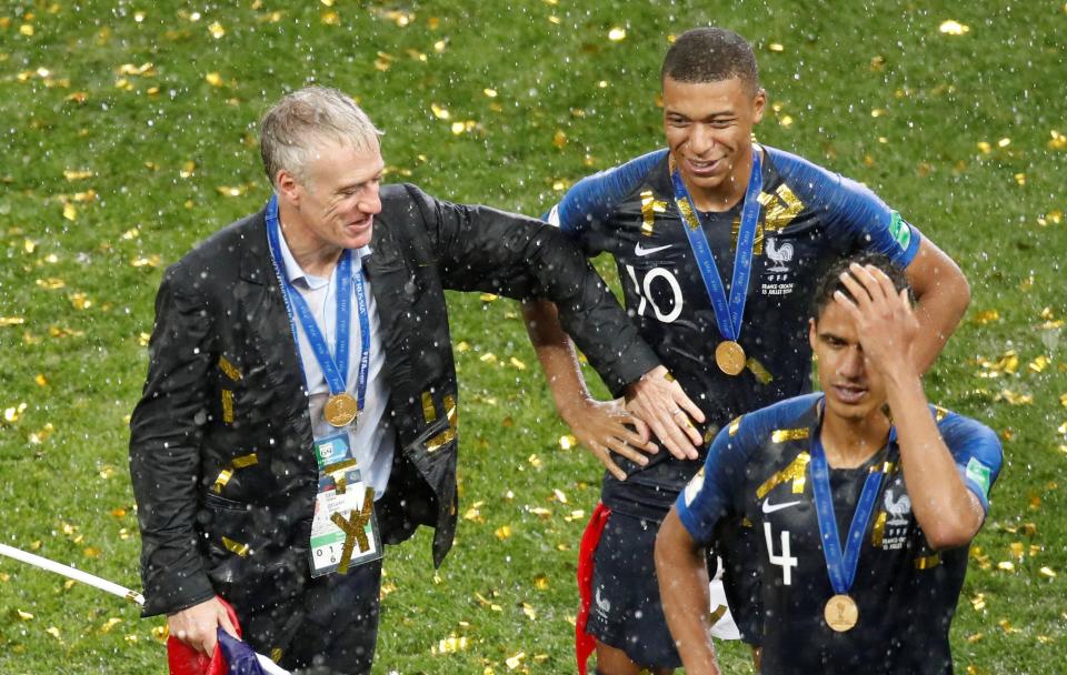  Deschamps and Mbappe celebrate France becoming world champions for a second time