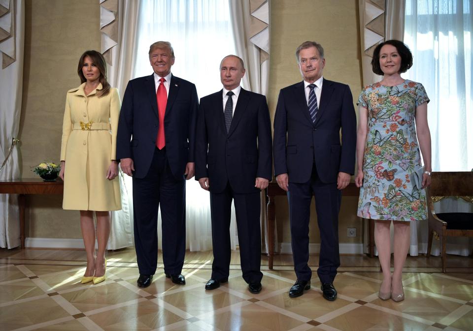  The couple seemed to 'thaw' for a group photo with Finland's President Sauli Niinisto (2nd right) and his wife