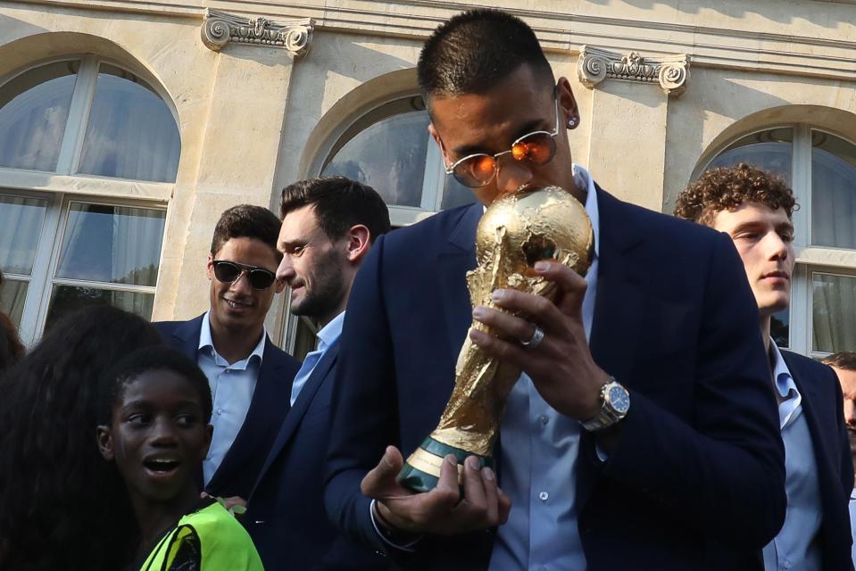  West Ham's shot-stopper kissed the Jules Rimet trophy outside the Elysee Presidential Palace after France won the 2018 World Cup