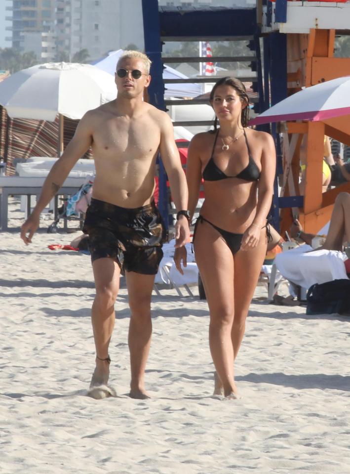  The pair looked in good spirits as they relaxed in Miami