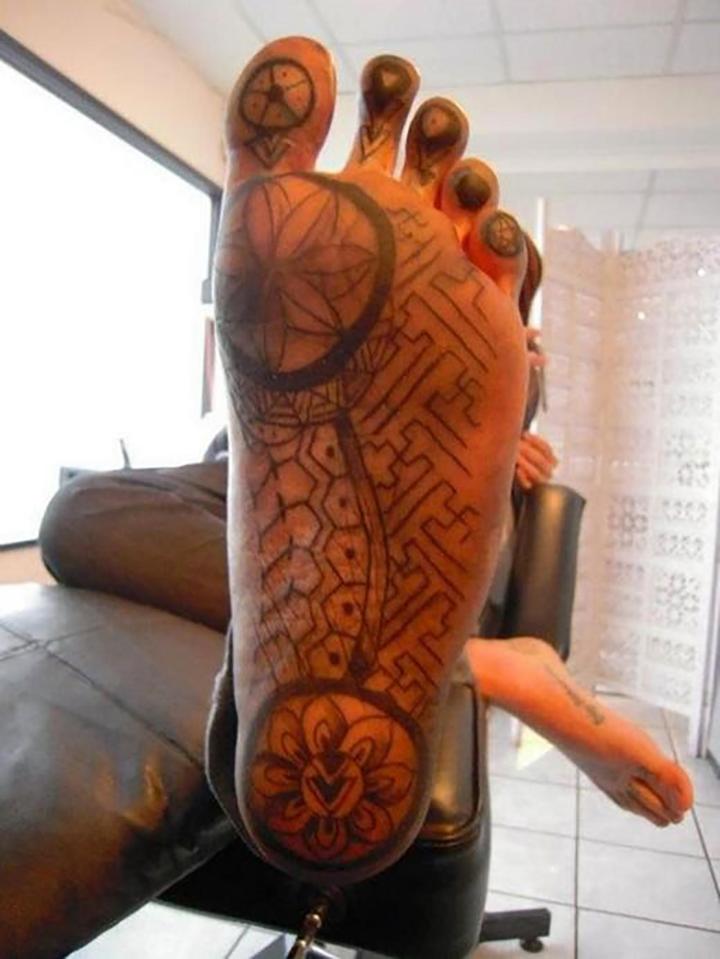  This tattoo fan had an extremely extensive and intricate pattern etched onto their foot