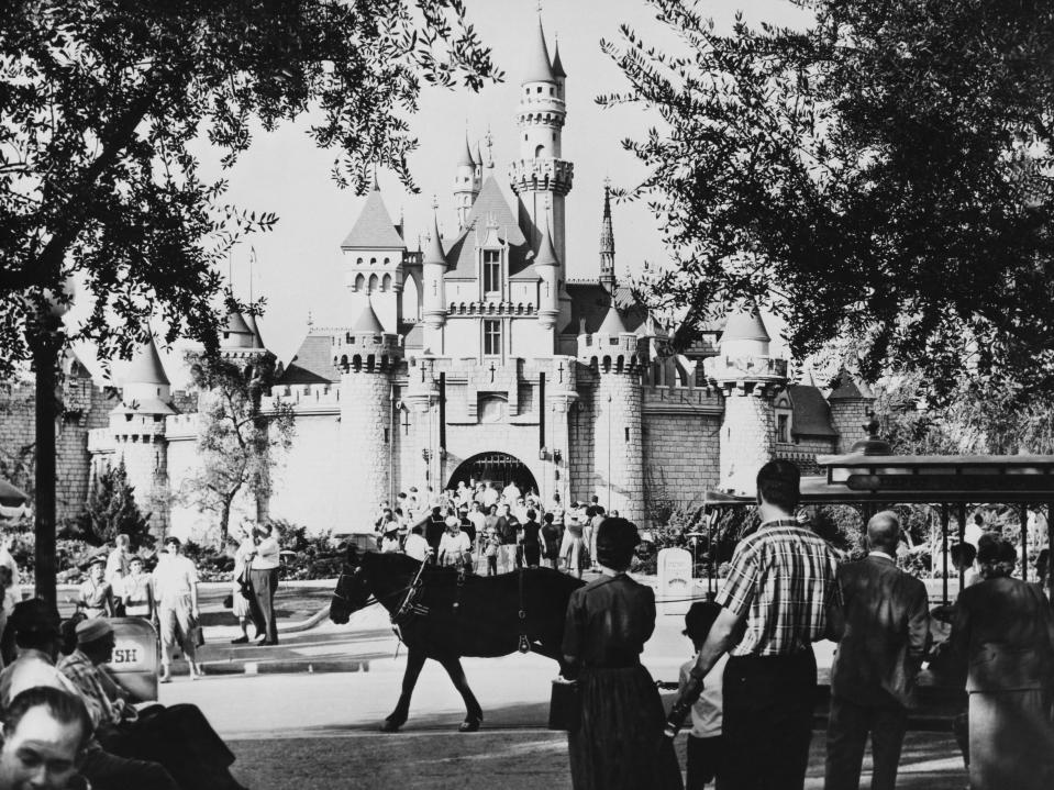 Crowds make their way through Cinderella Castle during the 1950s 