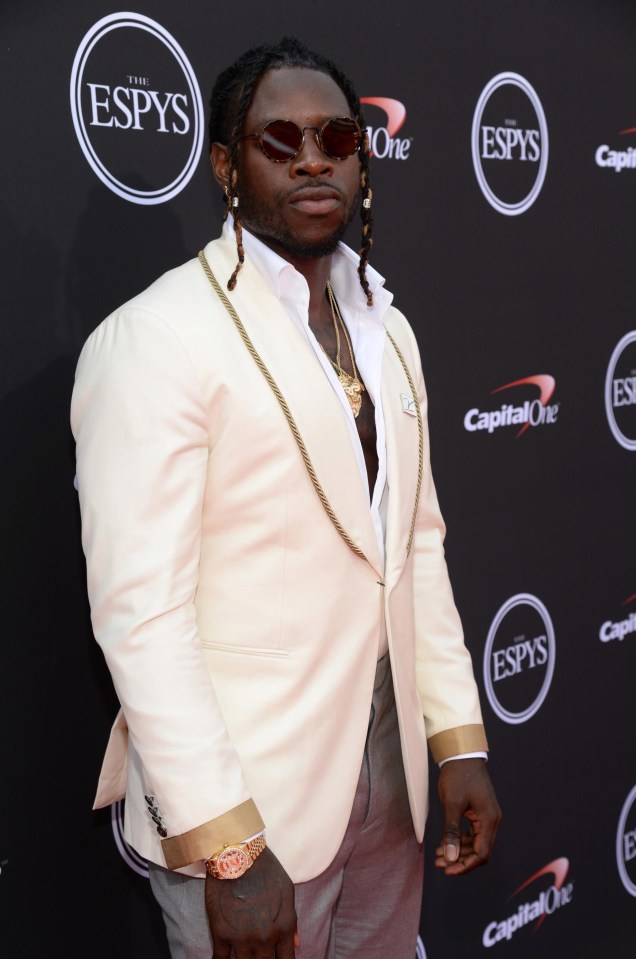 NFL player Jay Ajayi poses for the camera on the red carpet