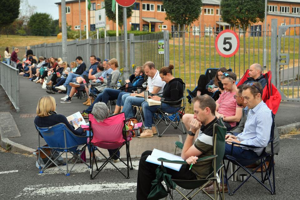  More than 130 parents queued for a spot in the breakfast club this morning