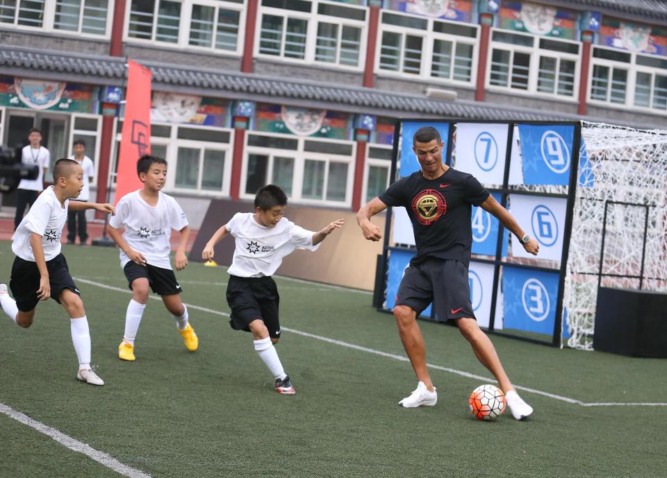 Cristiano Ronaldo enjoyed a kickabout with youngsters in China