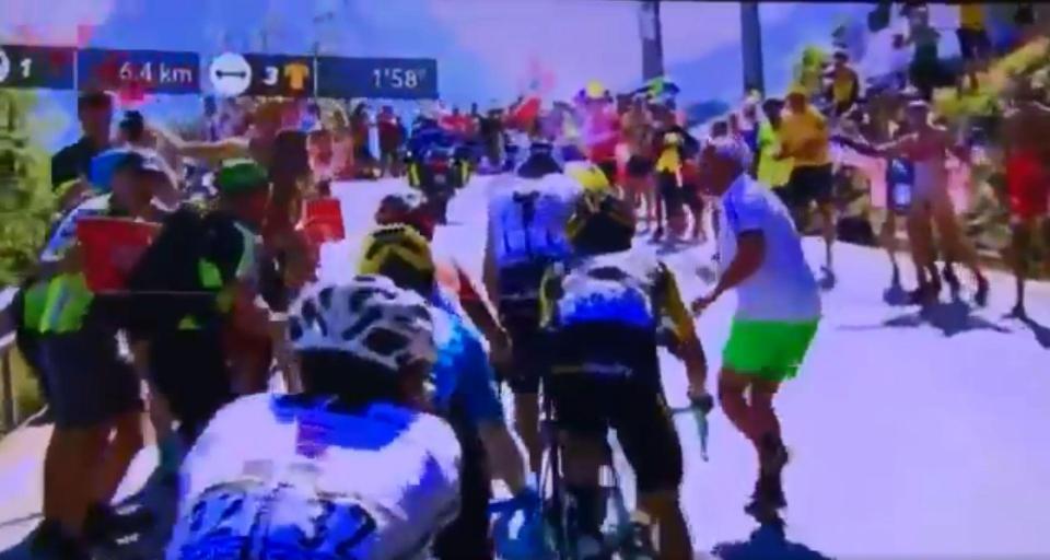 This was the moment a spectator ran forward towards Chris Froome