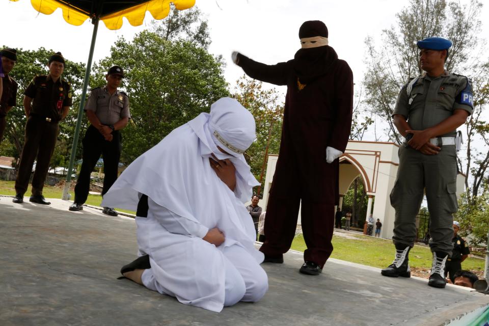  The distressed woman can be seen on her knees with her hand to her face