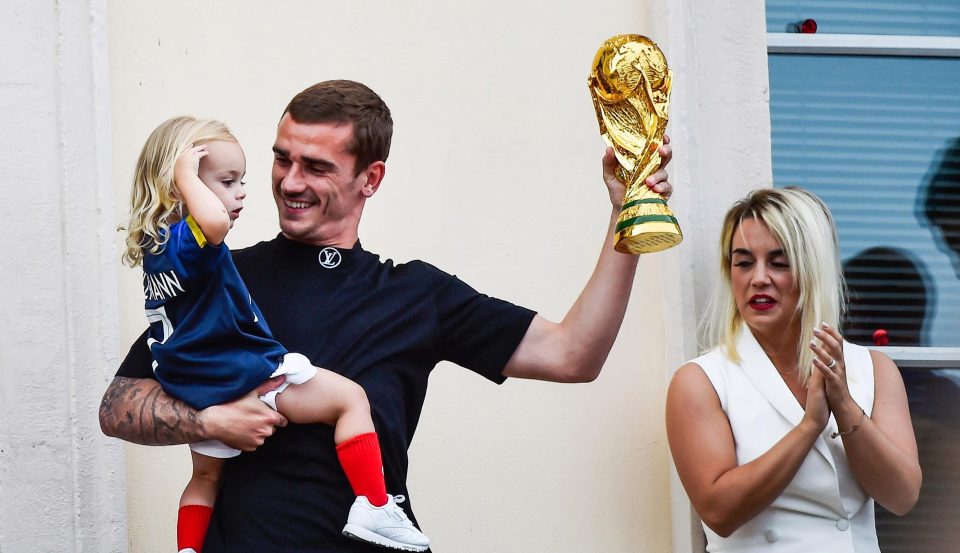  Griezmann with his wife, Erika Choperena and daughter Mia