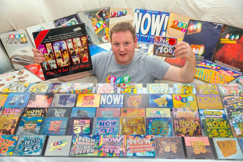  Superfan Darren surrounded by his precious collection of pop anthologies