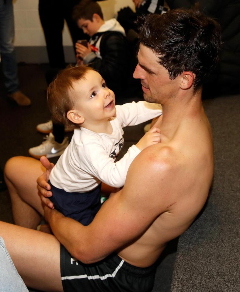  Pendlebury was decidedly more careful with son Jax after the game