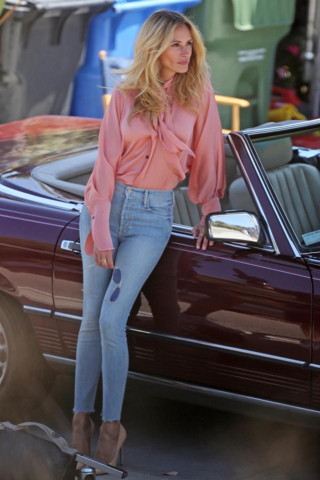  Julia Roberts looks pretty in pink during a day out in Malibu