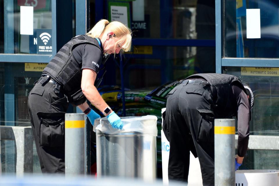  Police search outside Home Bargains following the incident