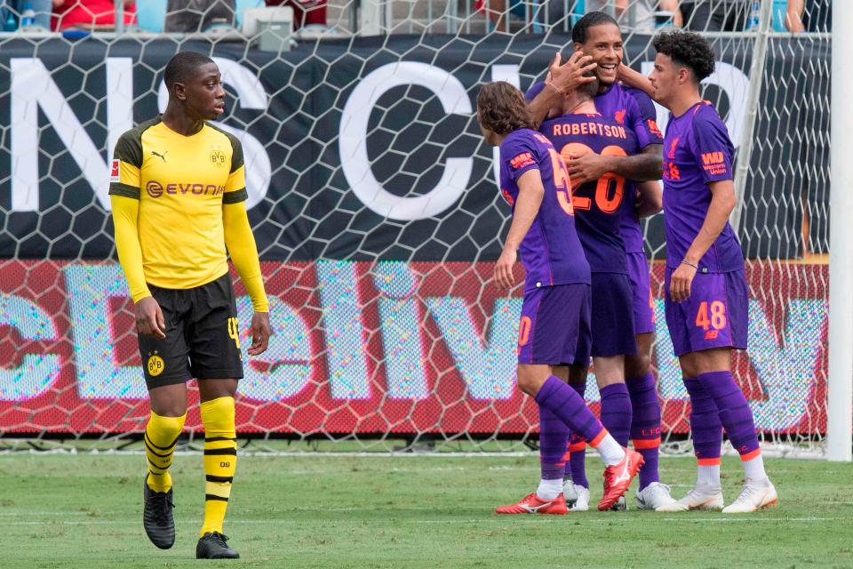 Liverpool celebrate taking the lead in Charlotte