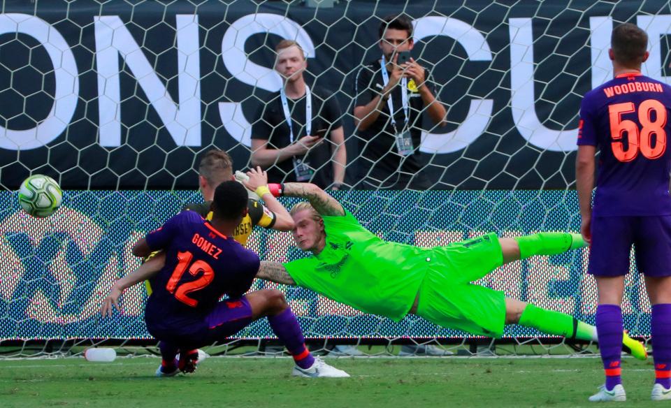  Jacob Bruun Larsen scores against Liverpool following a blunder from Loris Karius