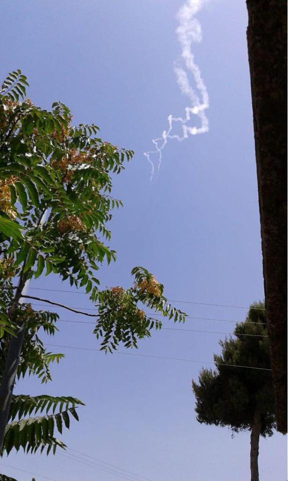  Trails from the missiles are pictured above. Israel's military has been on "elevated alert" along the frontier because of activity on the Syrian side of the fence, said military spokesman Lt. Col. Jonathan Conricus said