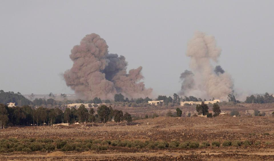  Smoke rises as a result of air strikes on the Syrian side of the Golan Heights as a Syrian Army's Sukhoi warplane was shot down by Israeli missiles after entering Israeli airspace