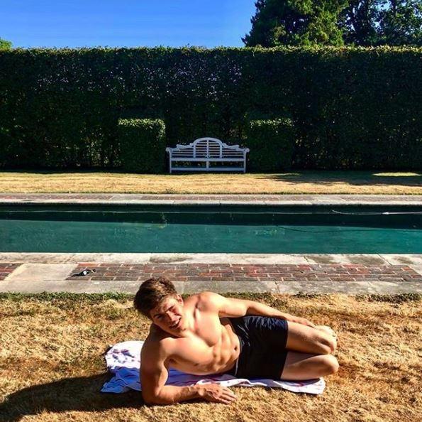 Arthur Chatto, 18, poses poolside on a recent getaway