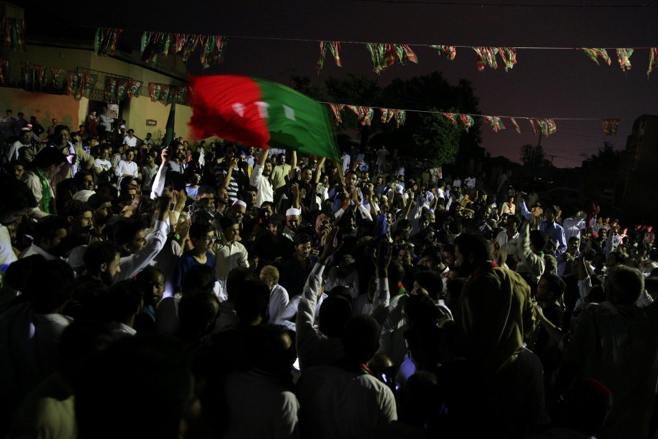 Supporters of Imran Khan, chairman of the Pakistan Tehreek-e-Insaf (PTI) political party, celebrate