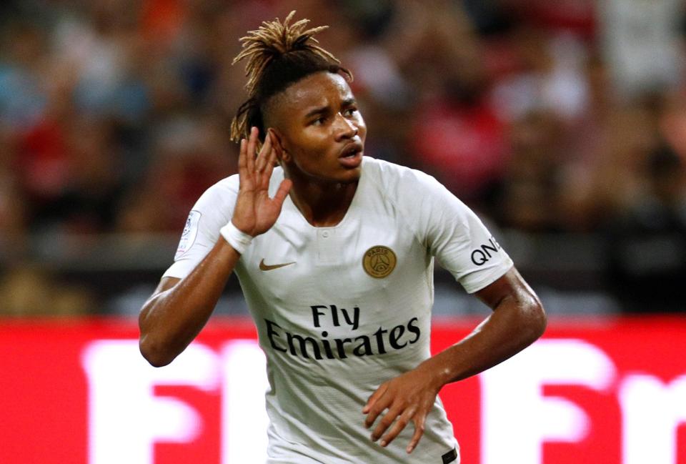  Young midfielder Nkunku reacts after levelling up the scores in Singapore