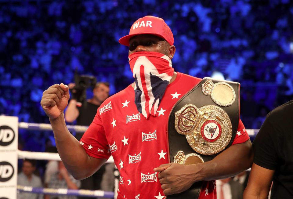  Chisora celebrates his victory over Takam