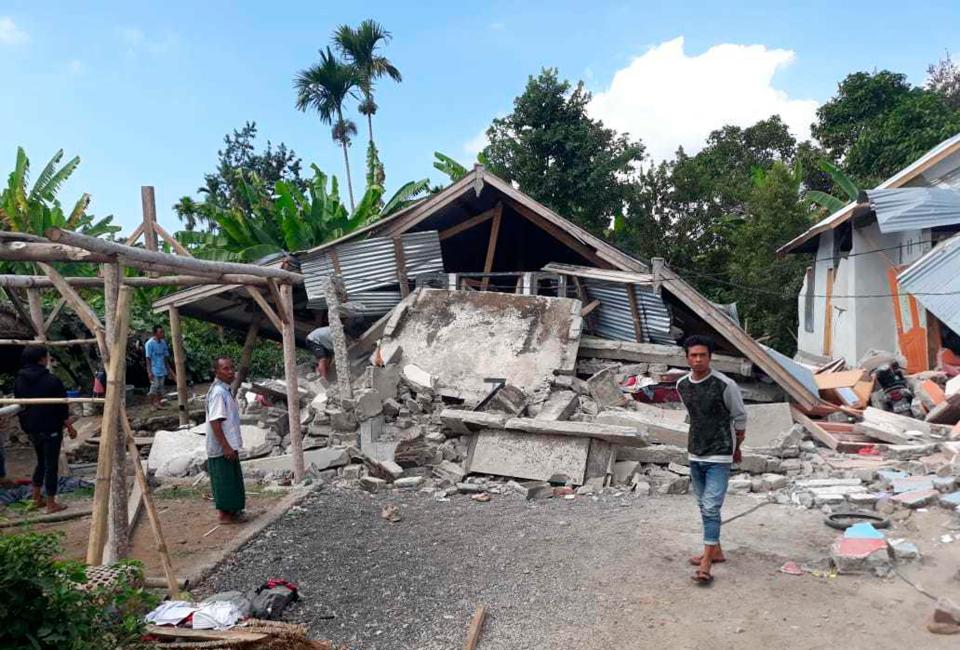  Villagers inspect their ruined livelihoods after the early morning earthquake on Lombok, Indonesia, on July 29