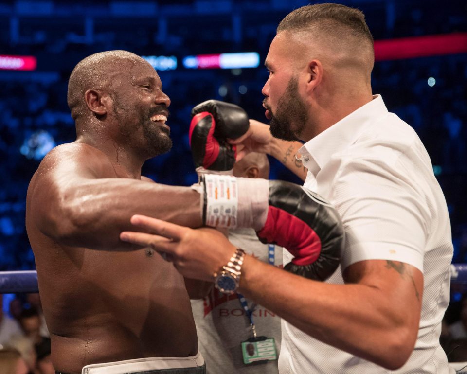 Dereck Chisora is congratulated by Tony Bellew after he knocked out Carlos Takam