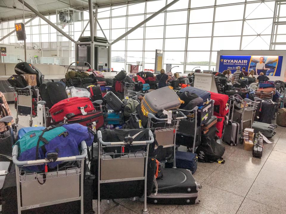  Mounds of luggage were piled up for the thousands of passengers whose flights were delayed or cancelled