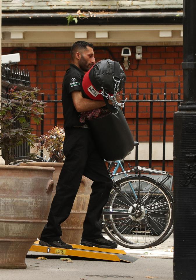  Gym equipment was also seen being hauled out by the removal men