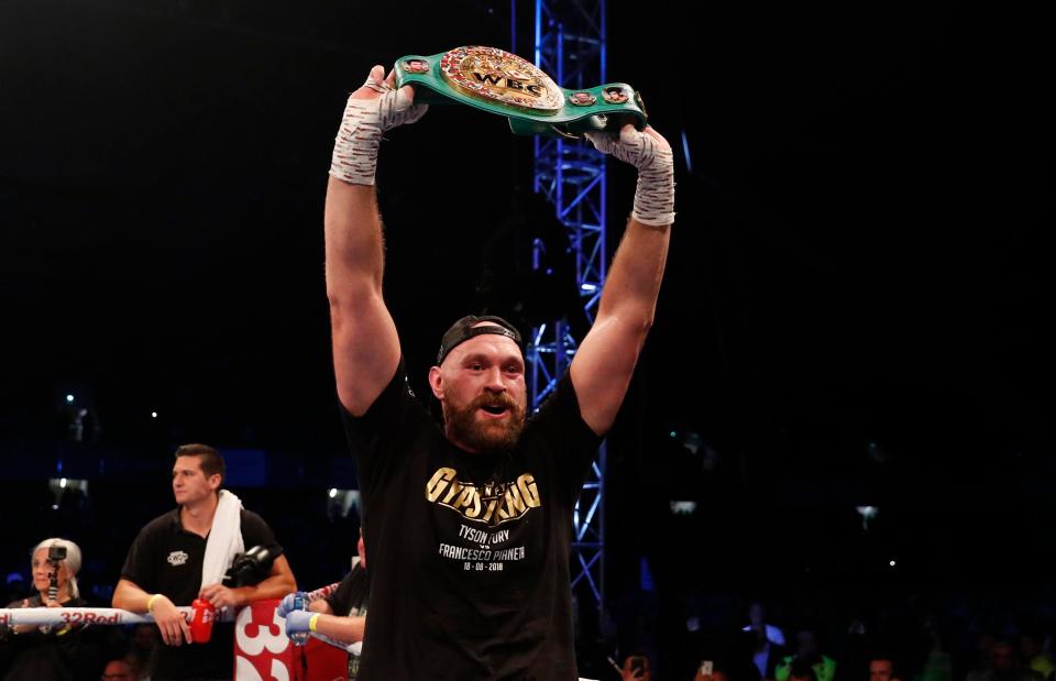  Fury couldn't resist stealing Wilder's WBC world title belt