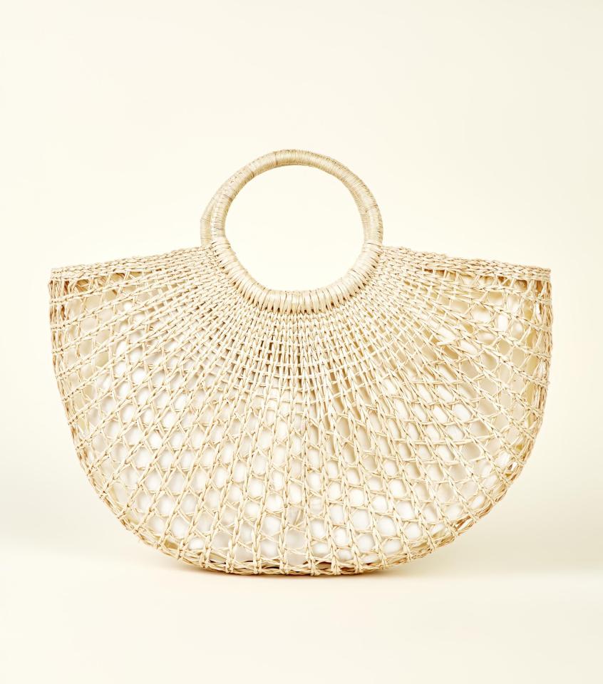  Because the woven trend is showing signs of going nowhere we might as well embrace it, and this New Look tote is particularly chic