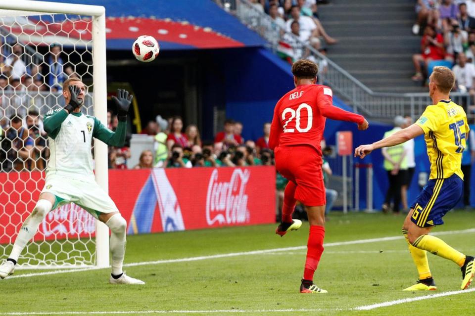  Dele Alli powers his header past Olsen to double the lead for England and put them on course for the semis