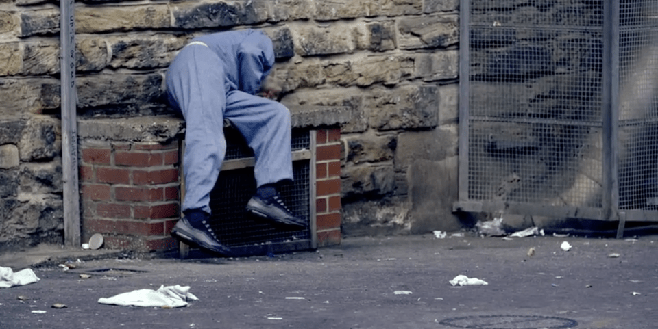 Stephen Lindsay is seen stumbling around the yard in a semi-comatosed state while Scott, Lewis and their gang jeer and heckle him