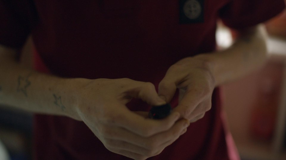 Stephen holding the drug spice, which is a synthetic form of cannabis