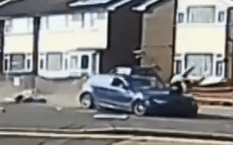  Horrifying CCTV footage shows the blue sports car swinging onto the wrong side of the road before mounting the footpath and crunching into the men as they walked to the pub