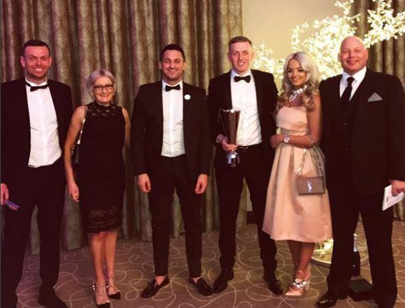  Pickford with his family (left to right): Dad, Lee, mum, Sue and brother, Richard, with Jordan, Megan and an unknown man