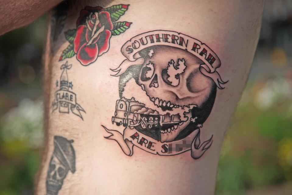  A fed-up Southern Rail passenger paid to get a tattoo reading 'Southern Rail are s***' on his ribs