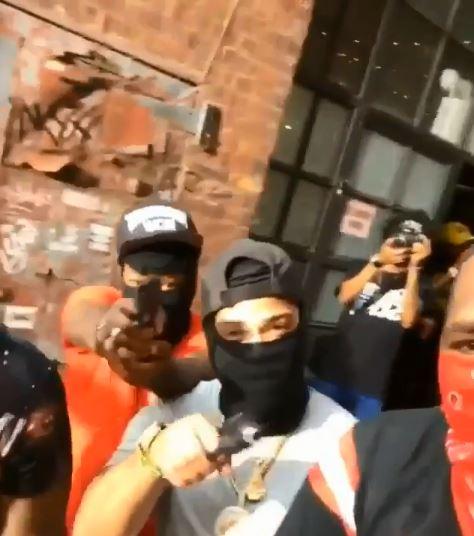  Other rap artists were shown holding fake guns in behinds the scenes content shared via Instagram