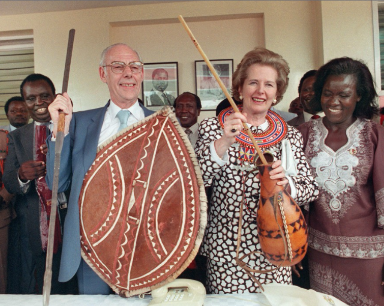  The late PM and husband Denis receiving gifts in Nairobi