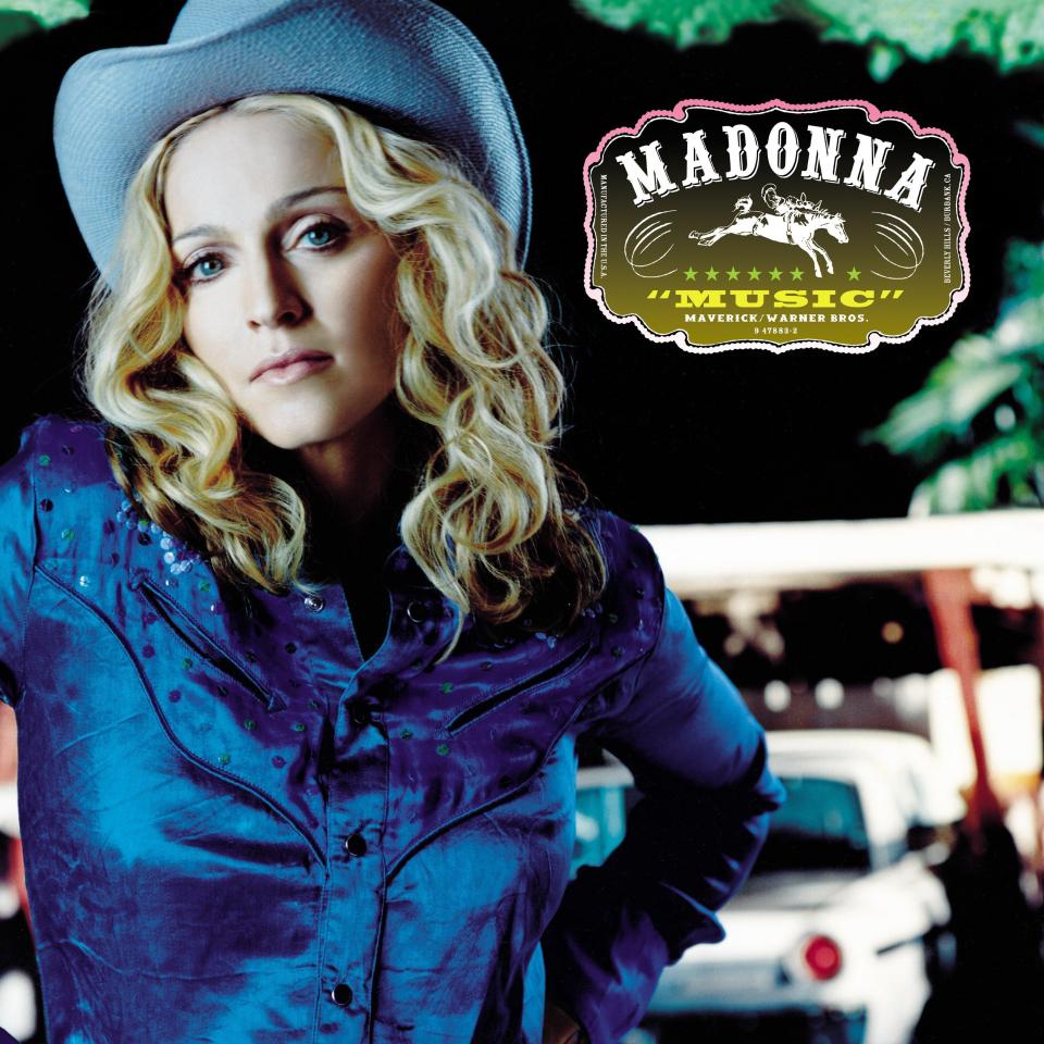  Music lets rock, country and folk into the mix along with Madonna's familiar dance pop