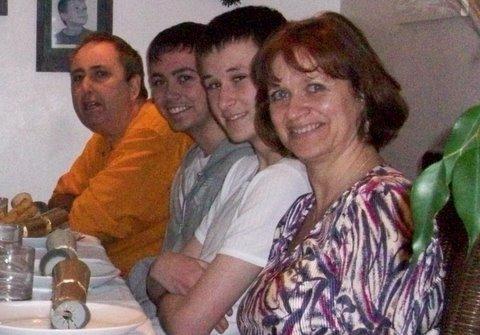 Diane Stewart is pictured with sons Jamie and Oliver and her husband Ian in December 2009