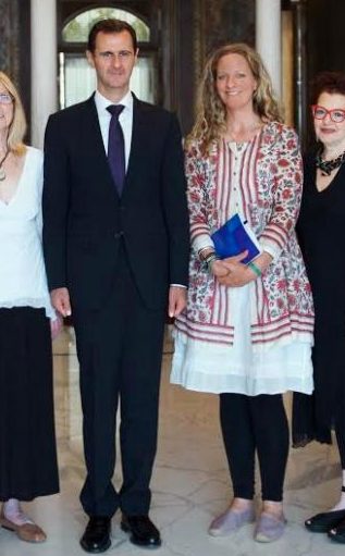  Ms Beeley pictured with Assad during a trip to Syria